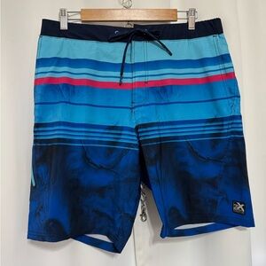 ZeroXposur Men's Blue and Pink Striped Swim Shorts Size: Medium